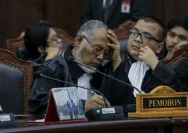 Ahmad Doli Kurnia memberikan keterangan mengenai dugaan pasal selundupan di PKPU