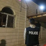 Aparat keamanan dan warga berkumpul pasca penembakan di Gereja Hammoud Karak Yordania