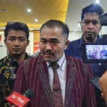 Foto Kamaruddin Simanjuntak saat menyampaikan keterangan pers