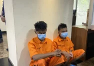 Garis polisi terpasang di lokasi penemuan jenazah wanita di kamar kos