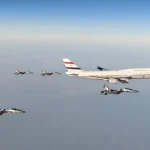 Jet tempur TNI AU mengawal pesawat kepresidenan Presiden Mesir Abdel Fattah El-Sisi saat memasuki wilayah udara Indonesia.