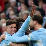 Pemain Manchester City merayakan kemenangan dalam pertandingan Liga Inggris melawan Liverpool