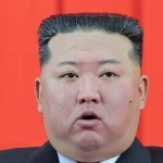 Pemimpin Korea Utara Kim Jong Un saat menghadiri pameran resmi