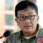 Sekretaris Utama BNPB Rustian saat menjalankan tugas kedinasan